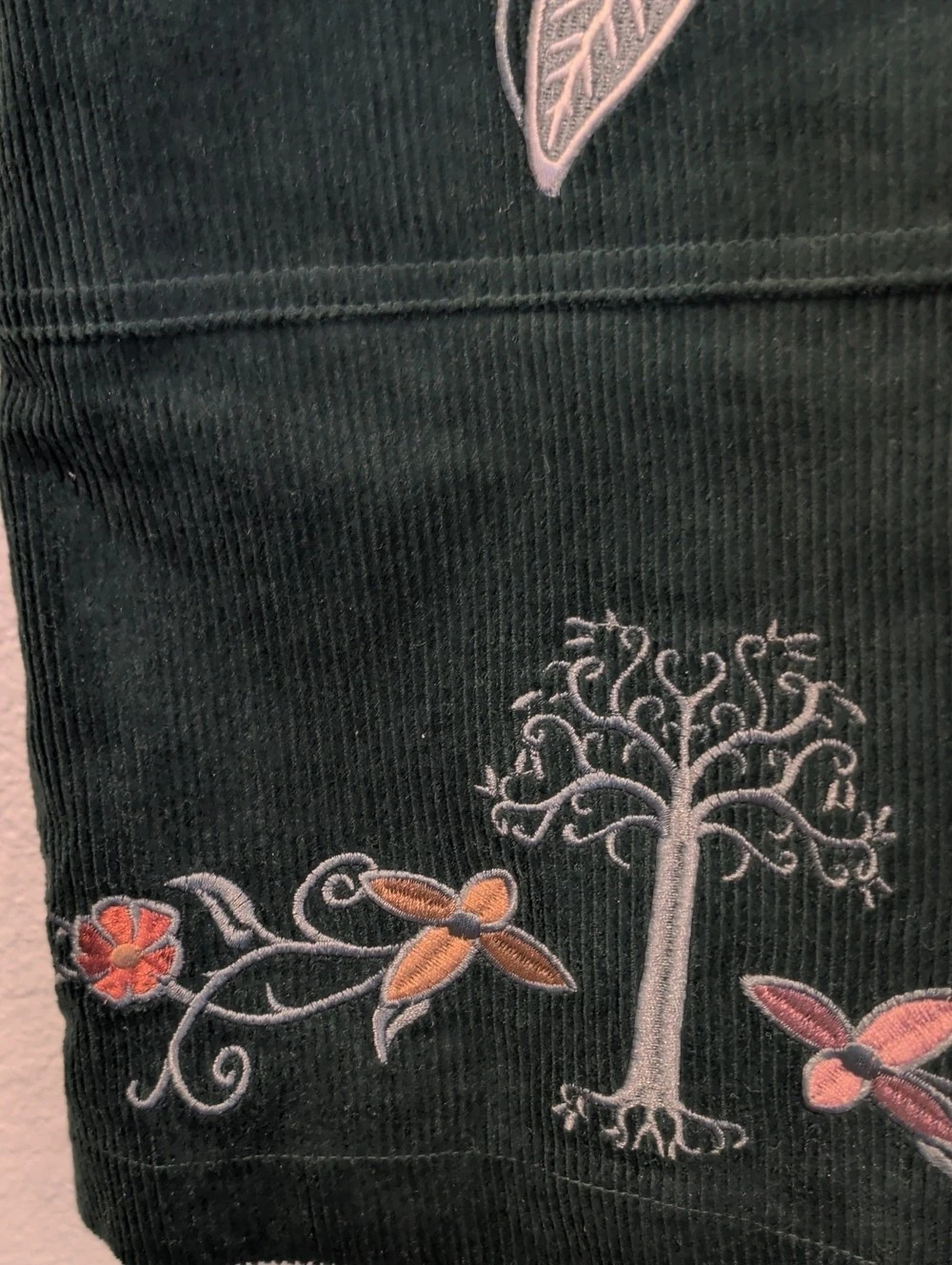 BoxLunch The Lord of the Rings Embroidered Icons Corduroy Overall Dress Green - Picture 12 of 16